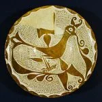 Dish with an image of a bird and Arabic inscription 10th-11th centuries