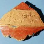 Fragment of a stamped karas-vessel band with lion images 10th-11th centuries