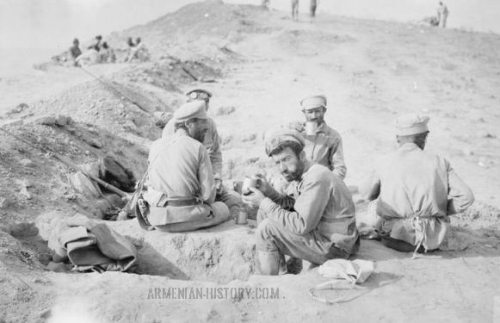 Armenian troops having a meal in front line trenches outside Baku