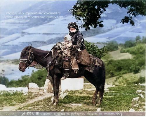 Armenian woman from Shushi with her child riding a horse, late 19th or early 20th century 